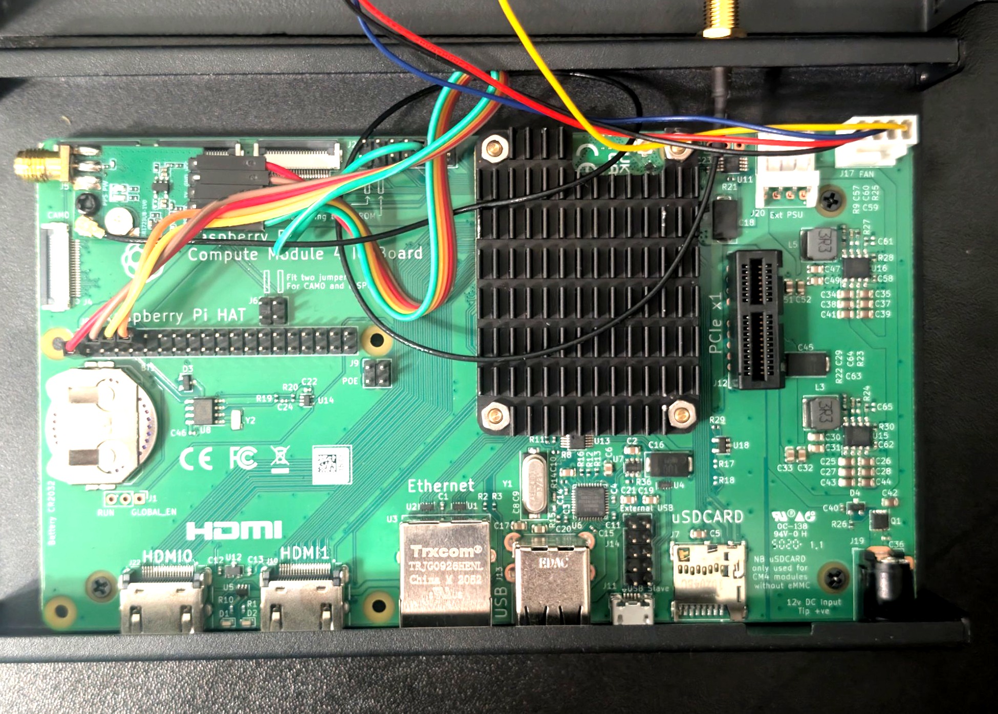 CM4 IO Board close-up: GPS wiring, heatsink, RTC battery, and all connectors labeled